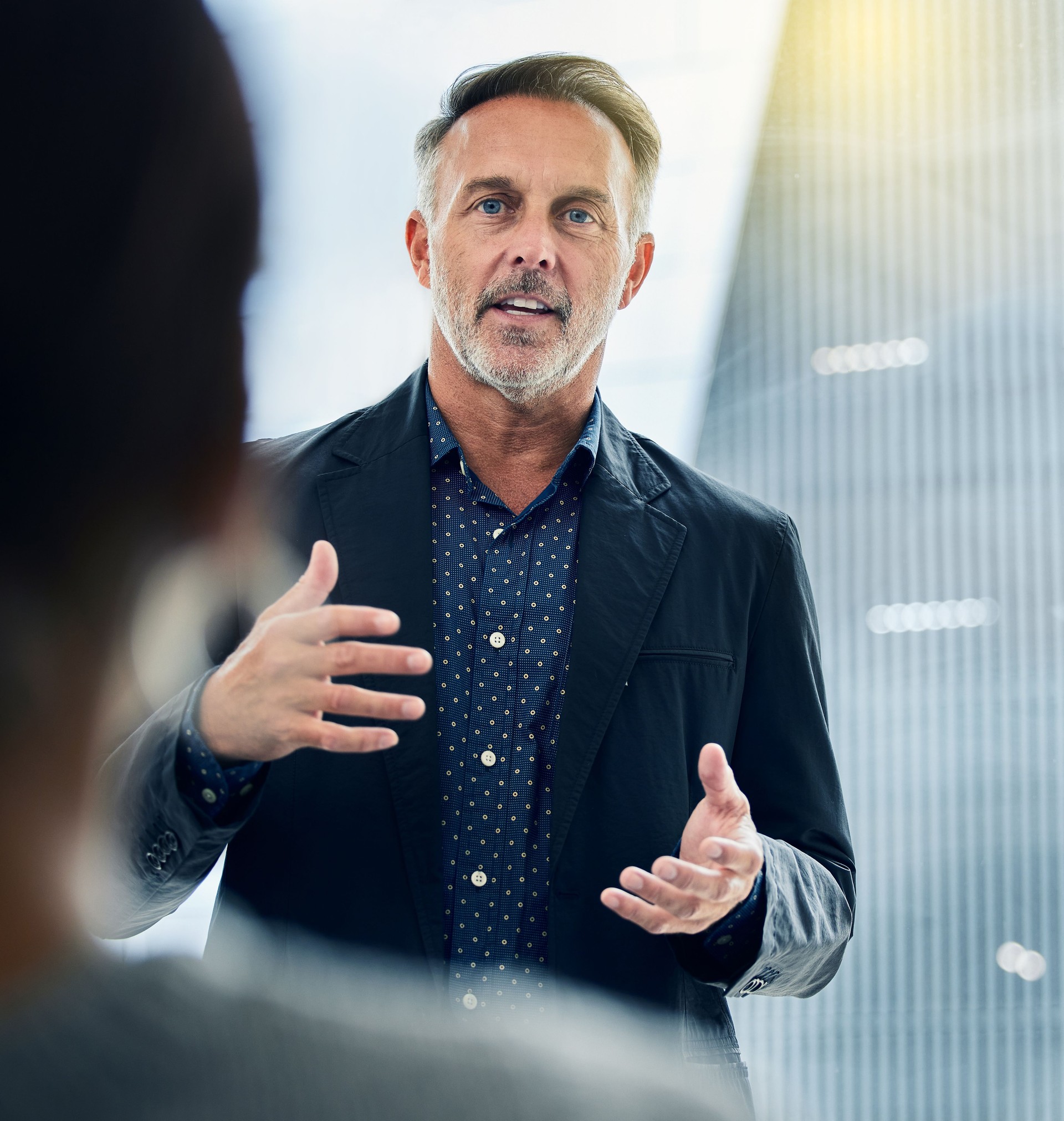 Shot of a businessman giving his staff a training seminar